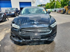 Photo 5 from auction – 2016 FORD FUSION with VIN 3FA6P0LU8GR304150