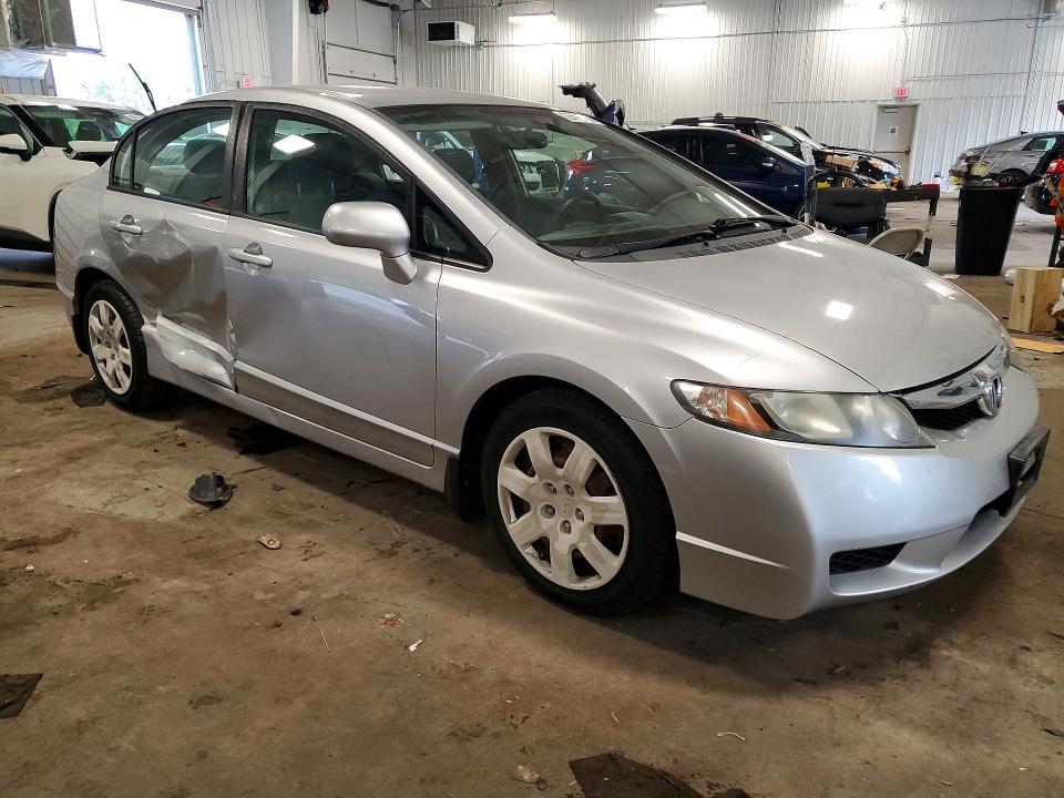 Photo 4 from auction – 2011 HONDA CIVIC with VIN 19XFA1F57BE040747