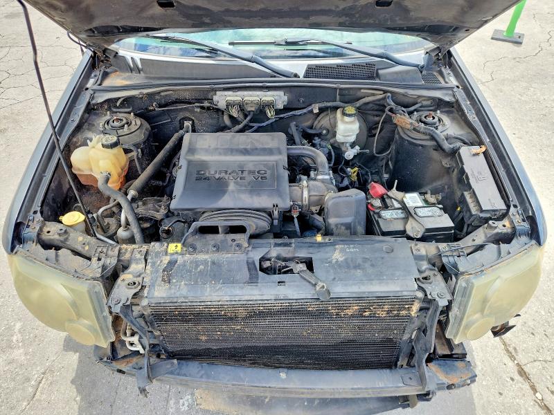 Photo 12 from auction – 2009 FORD ESCAPE with VIN 1FMCU94G79KA07330
