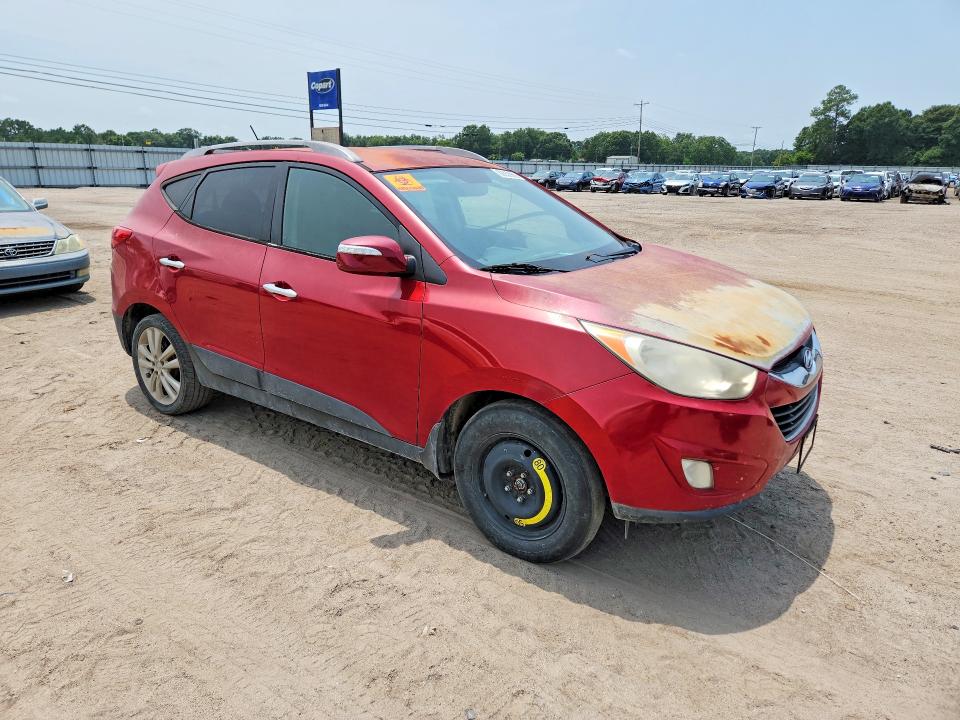 Photo 4 from auction – 2011 HYUNDAI TUCSON with VIN KM8JU3ACXBU256530