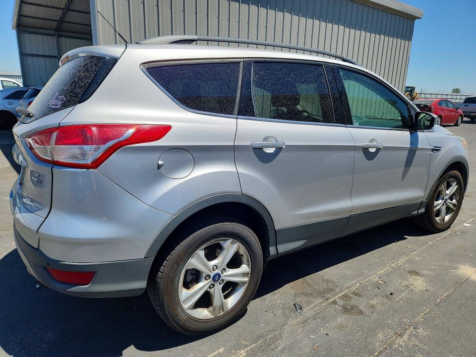 Photo 3 from auction – 2015 FORD ESCAPE with VIN 1FMCU9G90FUC66576