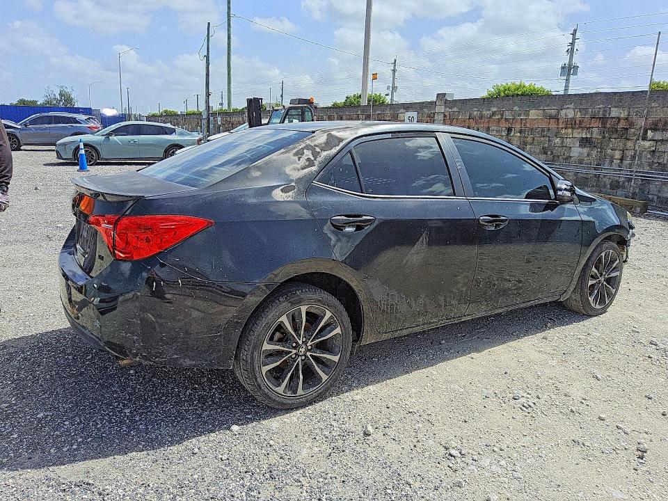 Photo 3 from auction – 2018 TOYOTA COROLLA with VIN 5YFBURHE3JP809565