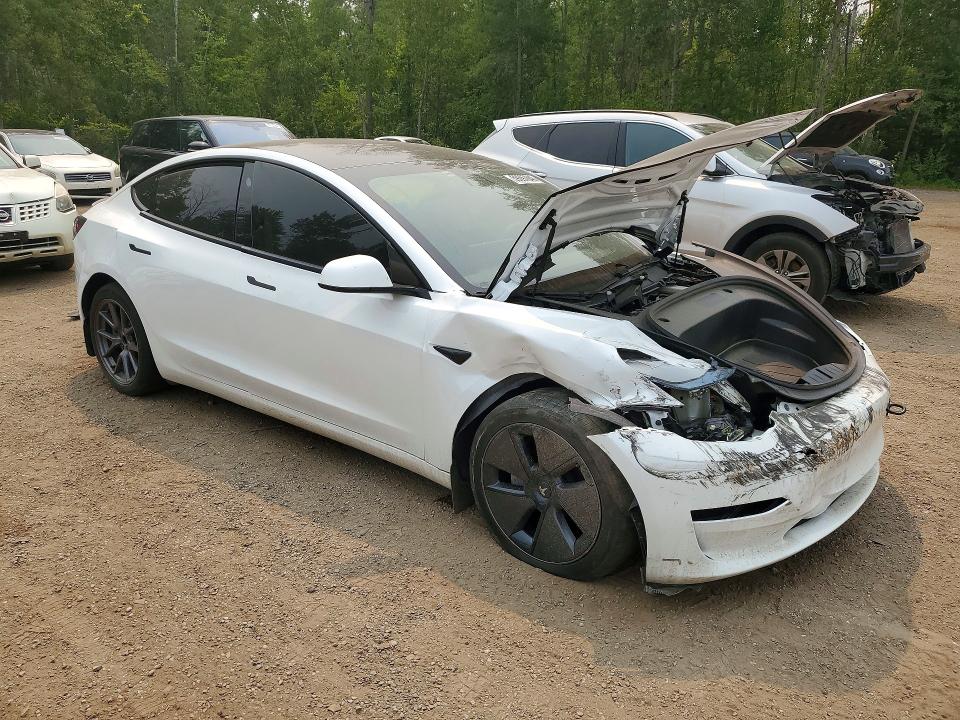 Photo 4 from auction – 2023 TESLA MODEL 3 with VIN LRW3E1FA4PC920658