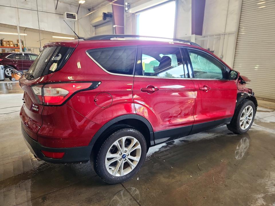 Photo 3 from auction – 2018 FORD ESCAPE with VIN 1FMCU9GDXJUA64440