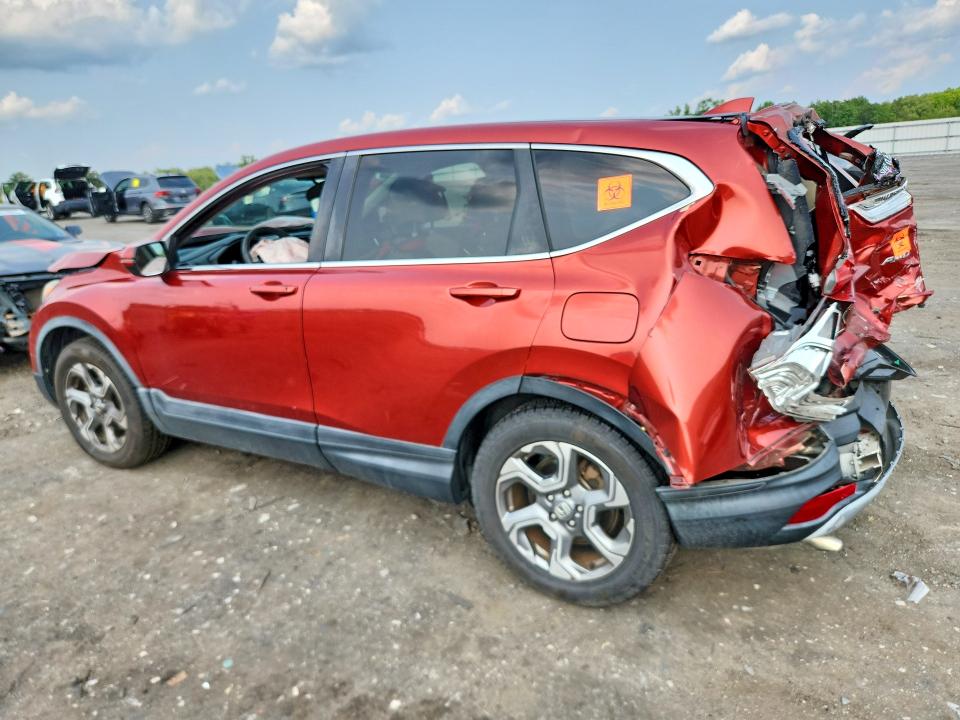 Photo 2 from auction – 2018 HONDA CR-V with VIN 2HKRW2H53JH645618