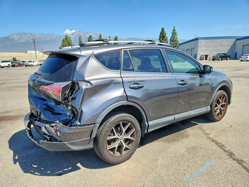 Photo 3 from auction – 2018 TOYOTA RAV4 with VIN JTMNFREV7JJ194650
