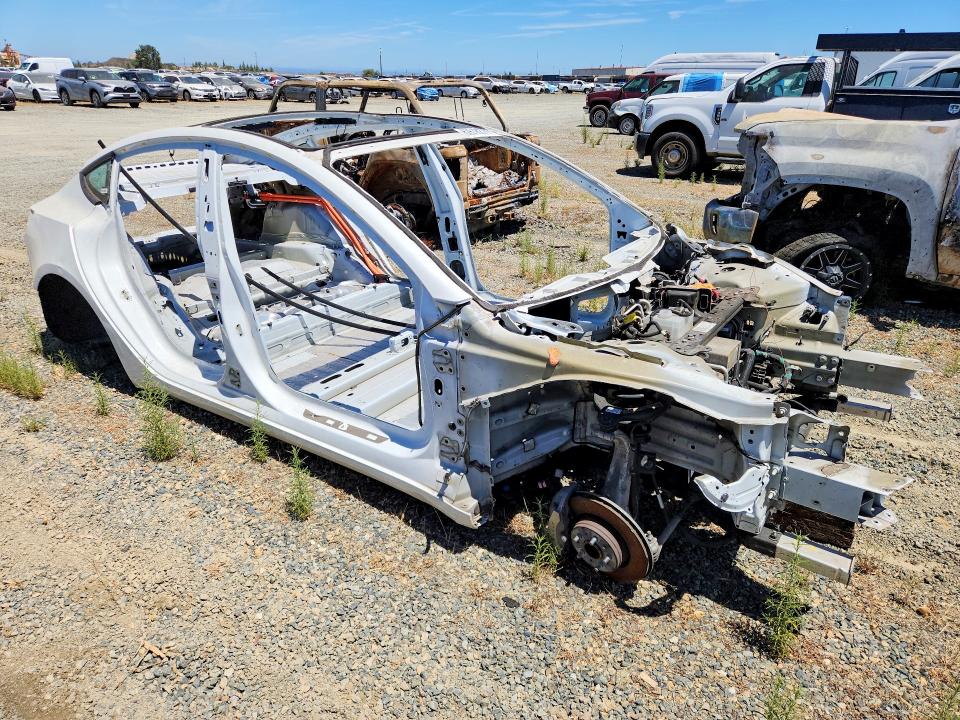 Photo 4 from auction – 2021 TESLA MODEL 3 with VIN 5YJ3E1EAXMF027588