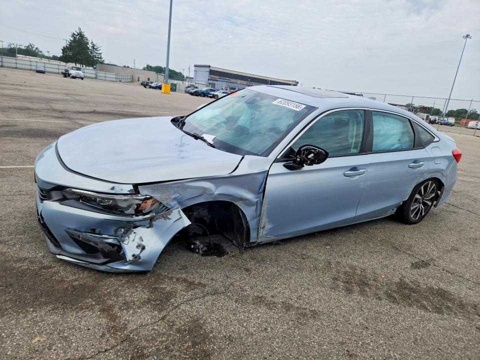 HONDA CIVIC 2023 with VIN 2HGFE1F72PH310423 - Photo from auction