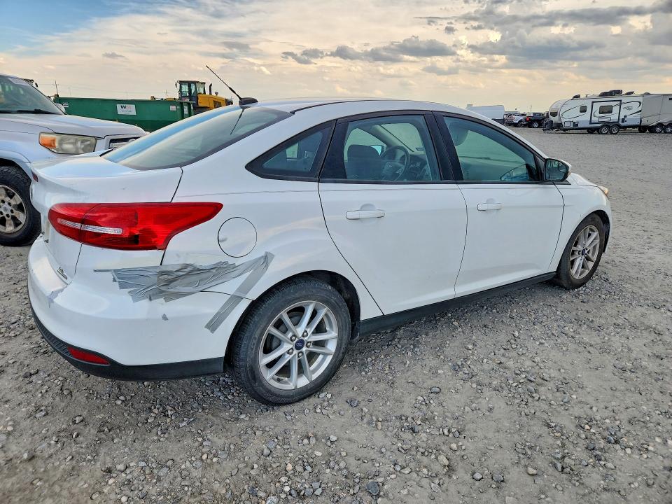 Photo 3 from auction – 2016 FORD FOCUS with VIN 1FADP3F26GL233953