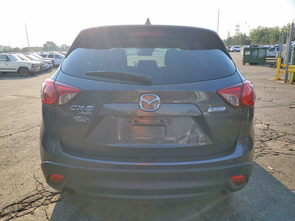 Photo 6 from auction – 2014 MAZDA CX-5 with VIN JM3KE4CY0E0376232