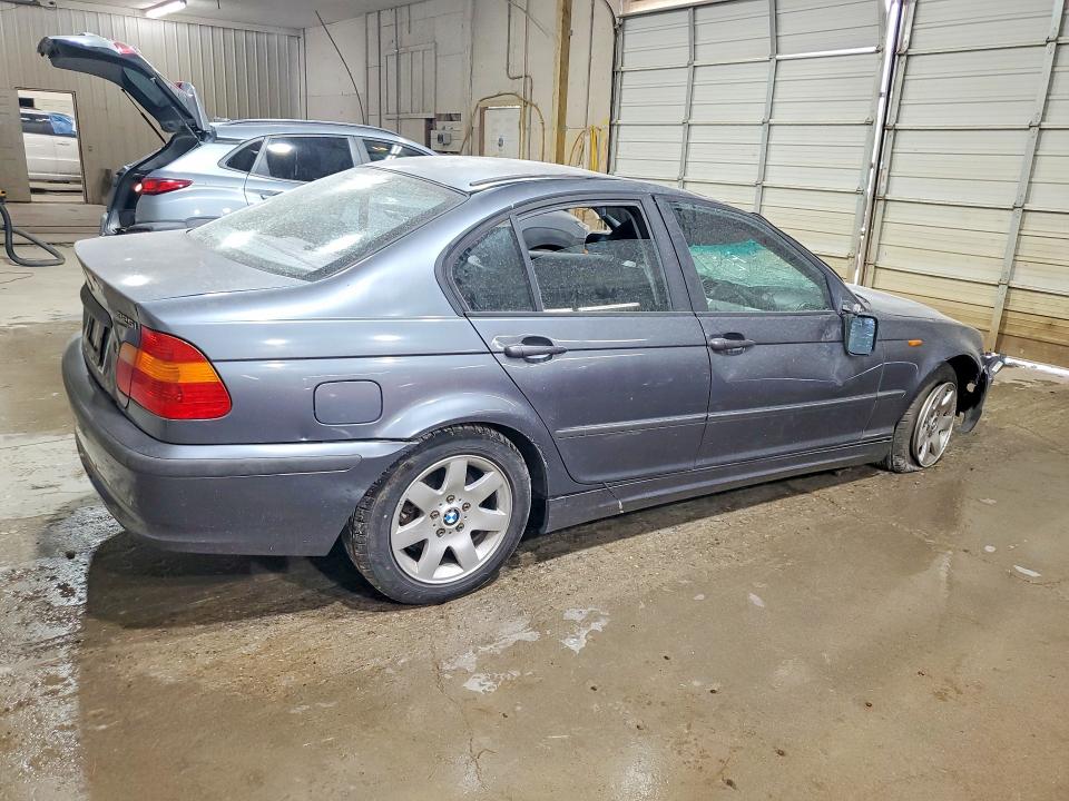 Photo 3 from auction – 2002 BMW 325 with VIN WBAEV33442KL72601