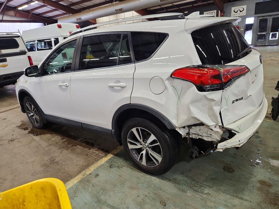 Photo 2 from auction – 2016 TOYOTA RAV4 with VIN 2T3RFREV0GW481310
