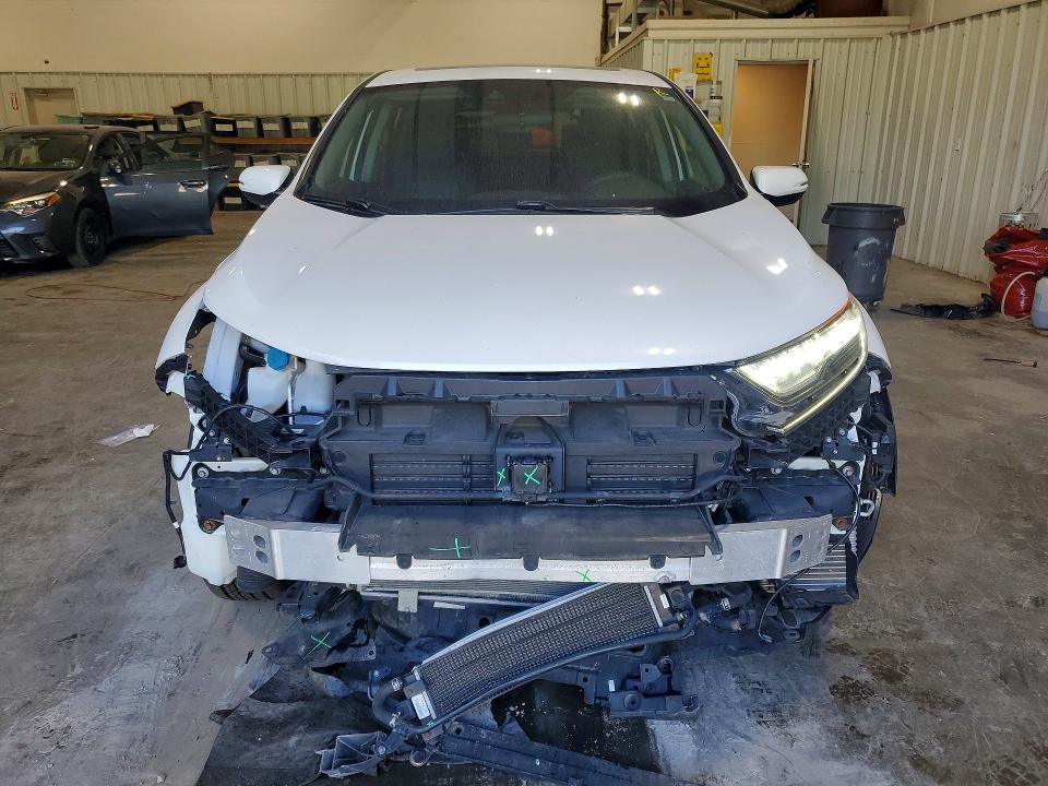 Photo 5 from auction – 2022 HONDA CR-V with VIN 5J6RT6H54NL001556
