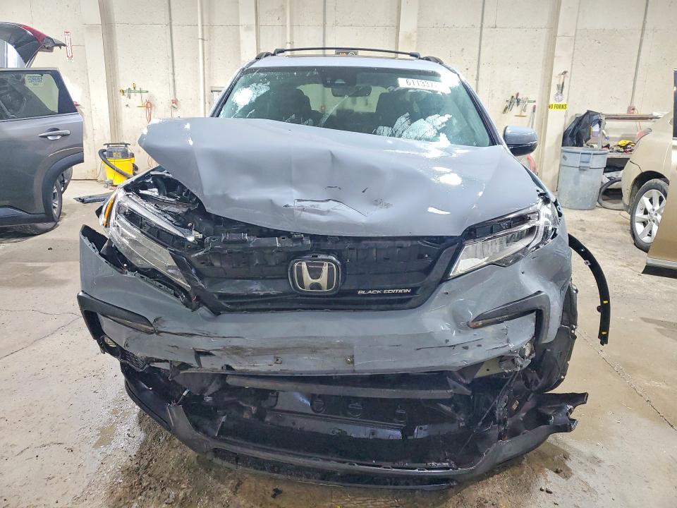 Photo 5 from auction – 2022 HONDA PILOT with VIN 5FNYF6H77NB061327