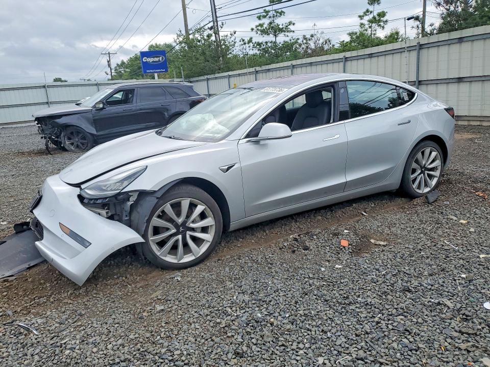 TESLA MODEL 3 2018 with VIN 5YJ3E1EA7JF007956 - Photo from auction