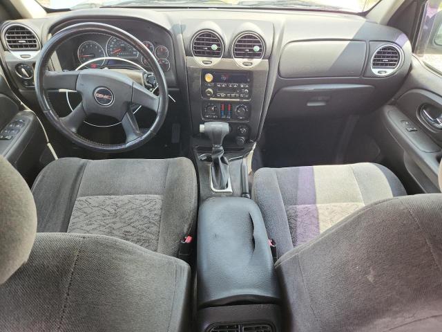 Photo 8 from auction – 2006 GMC ENVOY with VIN 1GKDT13SX62346232