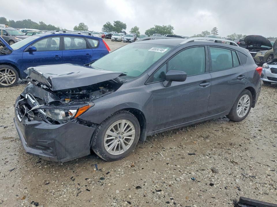 SUBARU IMPREZA 2018 with VIN 4S3GTAB66J3704829 - Photo from auction