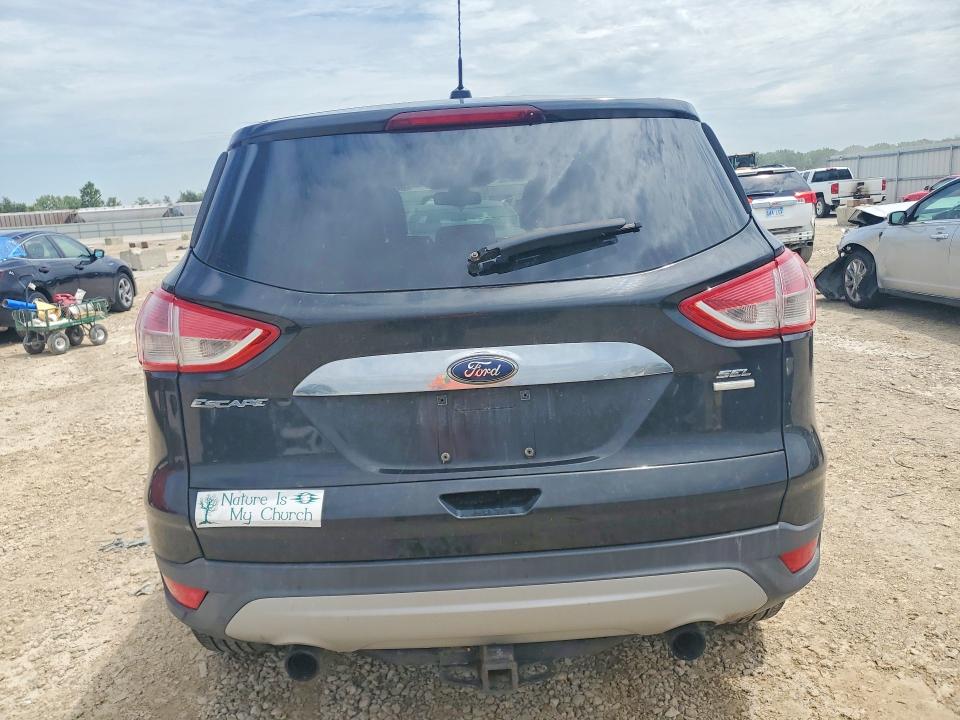 Foto 6 de la subasta – 2013 FORD ESCAPE con VIN 1FMCU9H91DUA72764