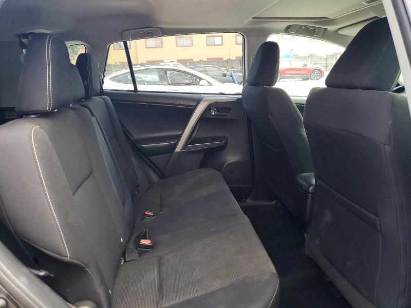 Photo 11 from auction – 2018 TOYOTA RAV4 with VIN 2T3WFREV8JW511728