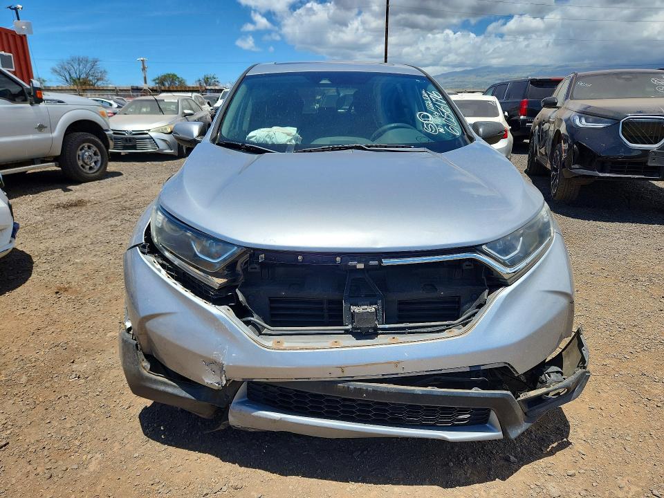 Photo 5 from auction – 2018 HONDA CR-V with VIN 5J6RW1H58JA005304