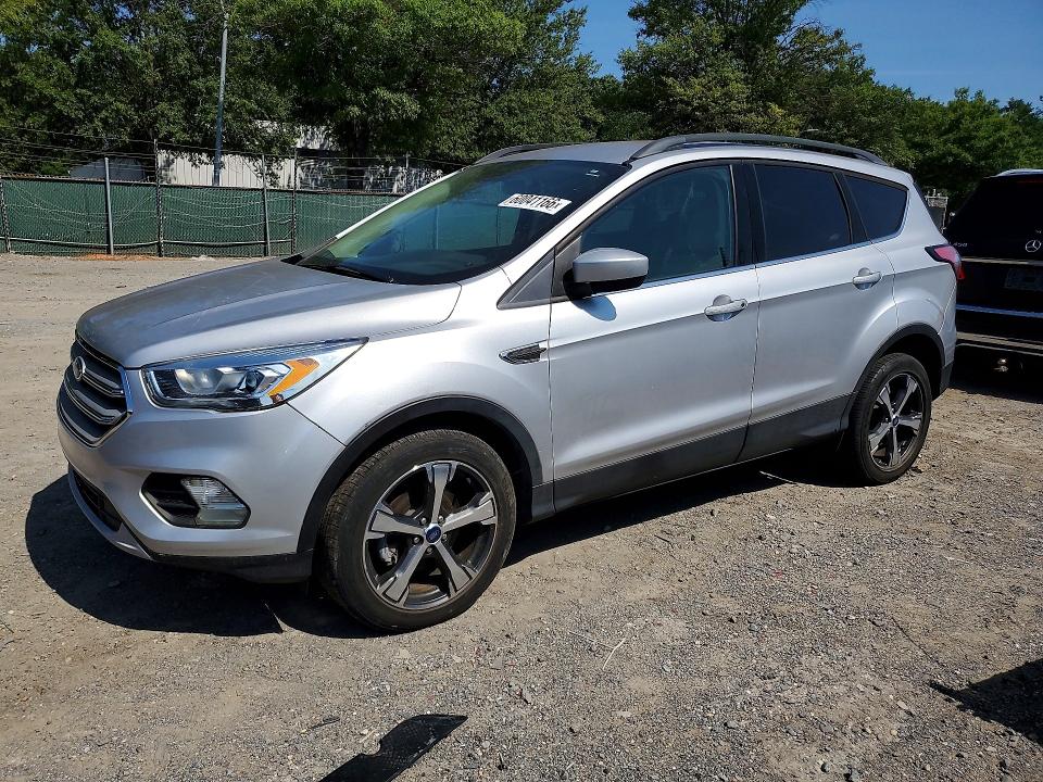 FORD ESCAPE 2018 with VIN 1FMCU0HD8JUD14719 - Photo from auction
