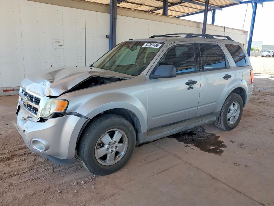 FORD ESCAPE 2011 with VIN 1FMCU0DG5BKA33555 - Photo from auction