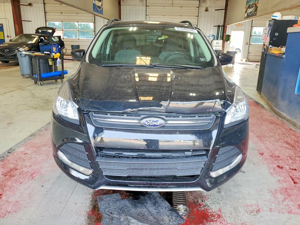 Photo 5 from auction – 2015 FORD ESCAPE with VIN 1FMCU9GX0FUB46775