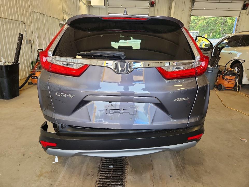 Photo 6 from auction – 2019 HONDA CR-V with VIN 5J6RW2H86KL028442