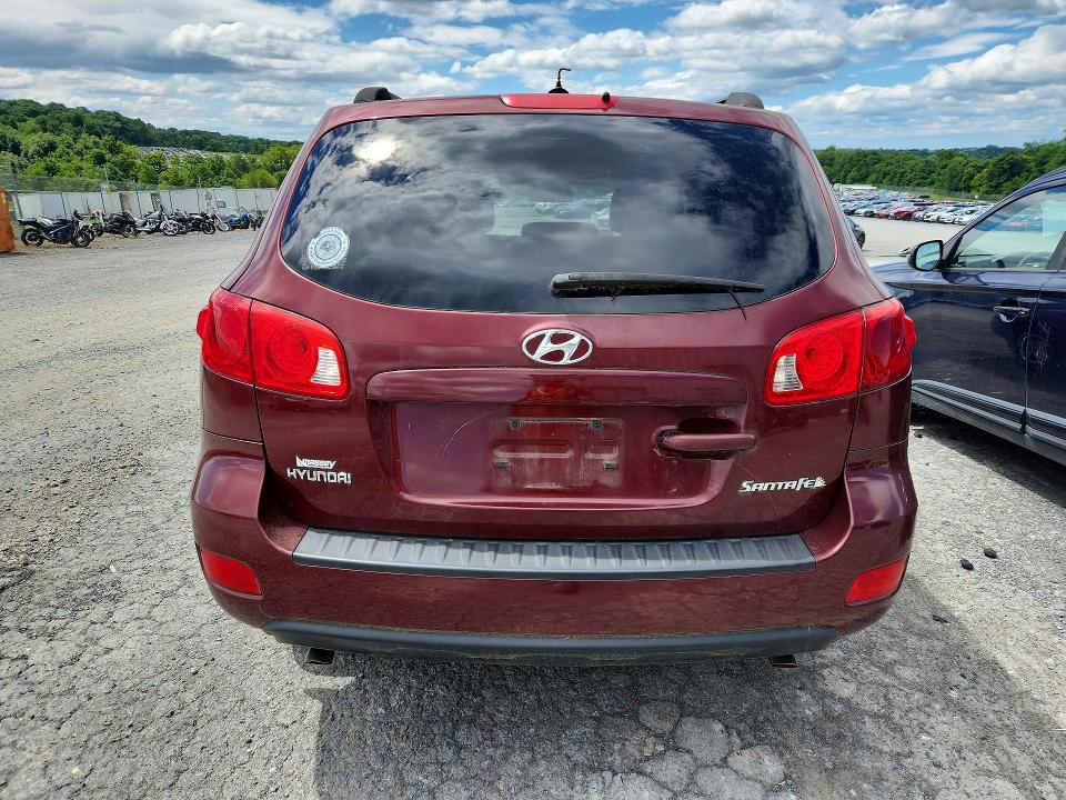 Foto 6 de la subasta – 2009 HYUNDAI SANTA FE con VIN 5NMSG13D89H326764