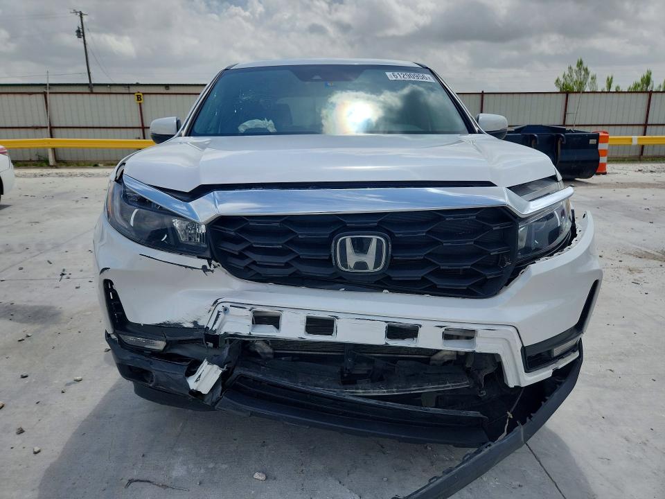 Photo 5 from auction – 2023 HONDA PASSPORT with VIN 5FNYF8H52PB040916