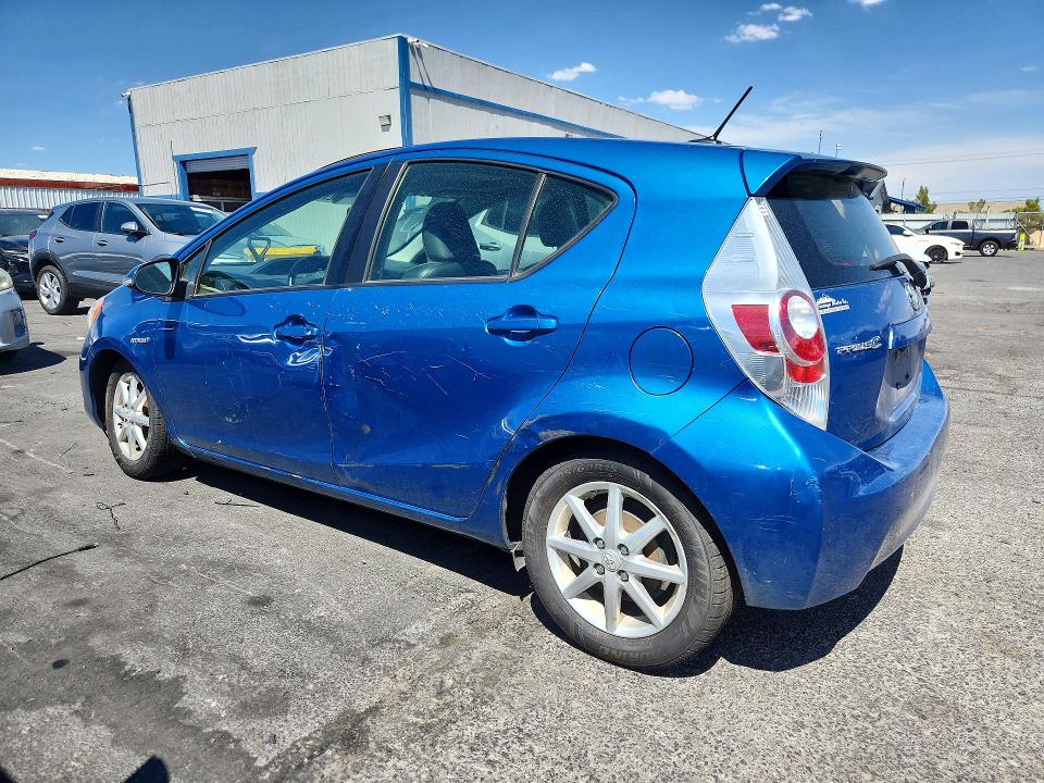 Photo 2 from auction – 2014 TOYOTA PRIUS C with VIN JTDKDTB35E1066826