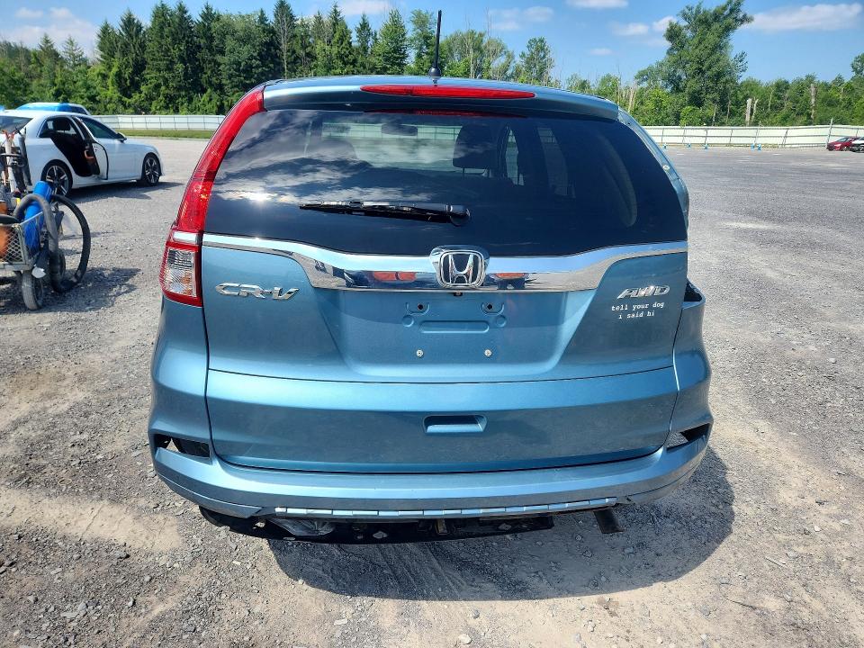 Photo 6 from auction – 2016 HONDA CR-V with VIN 2HKRM4H54GH723527