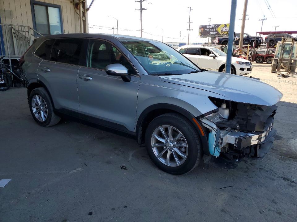 Photo 4 from auction – 2023 HONDA CR-V with VIN 2HKRS4H75PH409814
