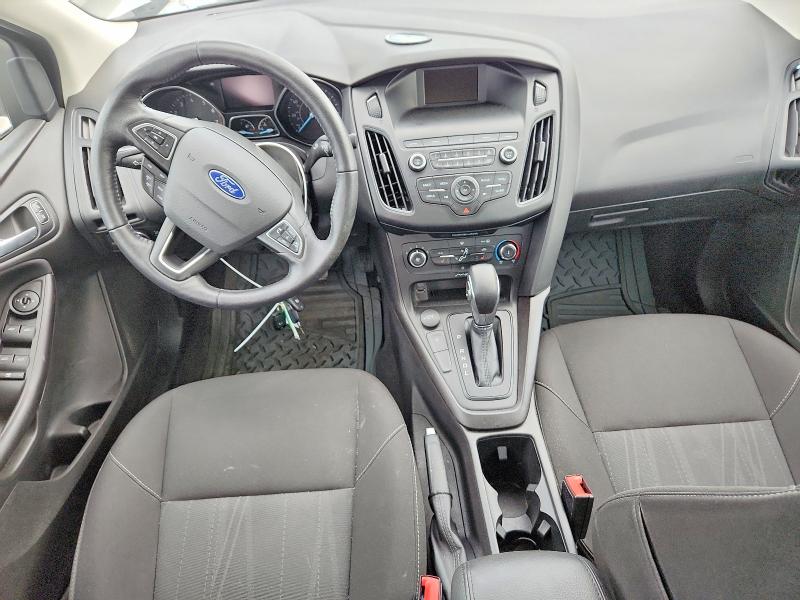 Photo 8 from auction – 2018 FORD FOCUS with VIN 1FADP3F21JL268505