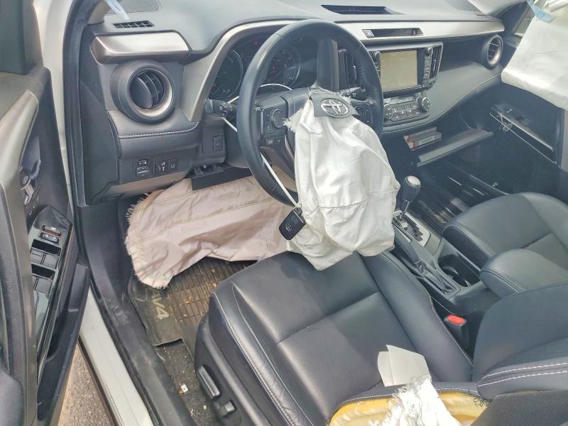 Photo 8 from auction – 2018 TOYOTA RAV4 HV with VIN JTMDJREVXJD187216
