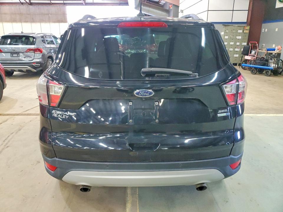 Photo 6 from auction – 2018 FORD ESCAPE with VIN 1FMCU9HD2JUB93917