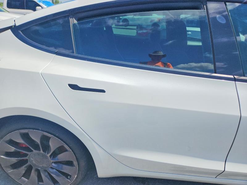 Photo 10 from auction – 2021 TESLA MODEL 3 with VIN 5YJ3E1ECXMF088456