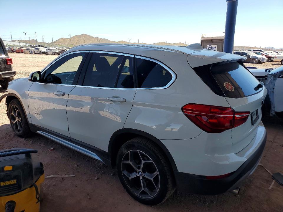 Photo 2 from auction – 2018 BMW X1 with VIN WBXHU7C37J5H45084