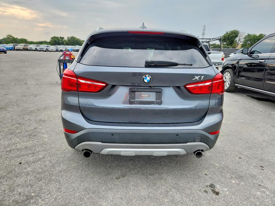 Photo 6 from auction – 2017 BMW X1 with VIN WBXHT3C38H5F81981