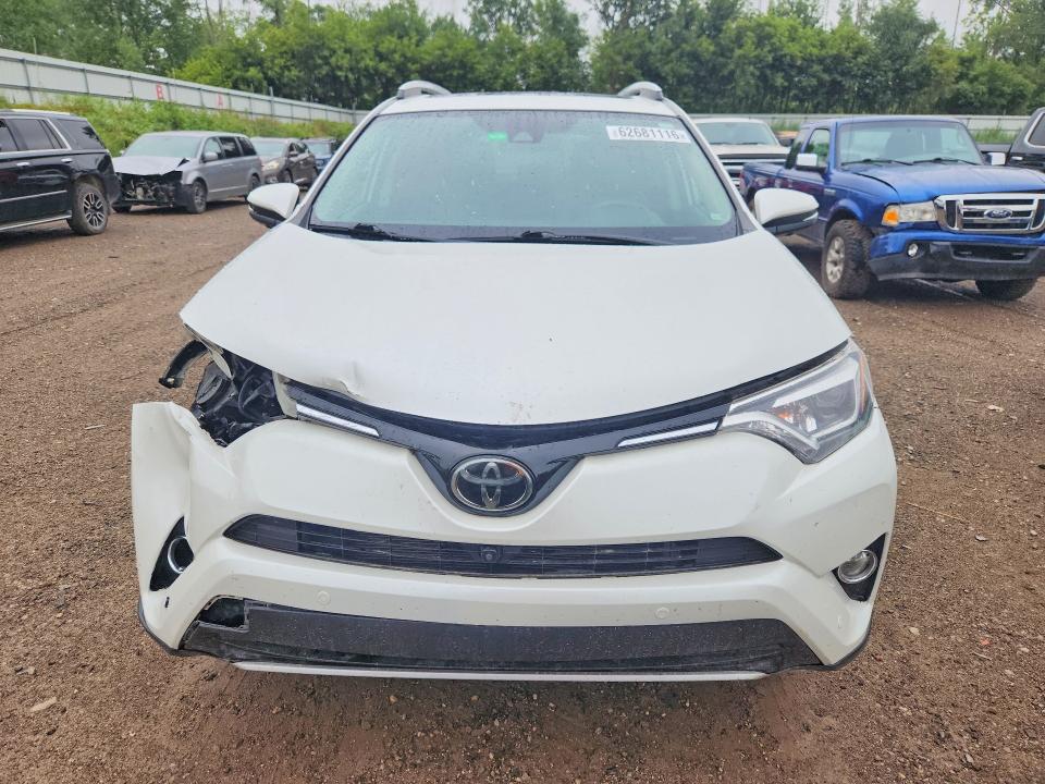 Photo 5 from auction – 2016 TOYOTA RAV4 with VIN 2T3DFREV9GW461079