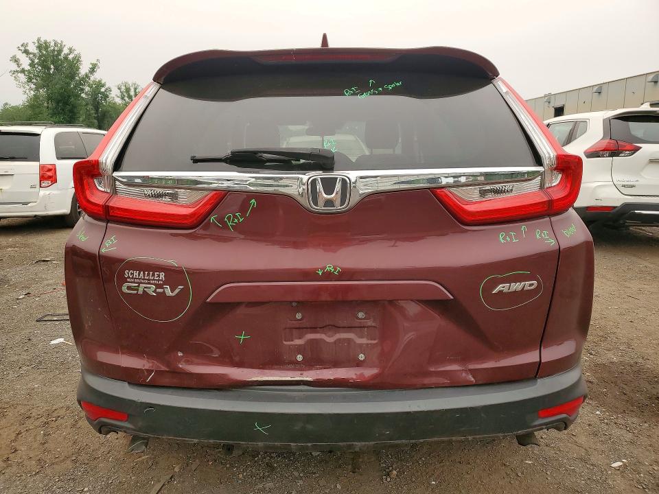 Photo 6 from auction – 2018 HONDA CR-V with VIN 2HKRW2H52JH699752