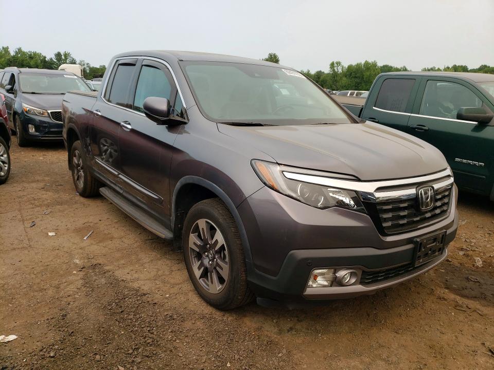 Photo 4 from auction – 2019 HONDA RIDGELINE with VIN 5FPYK3F73KB015509