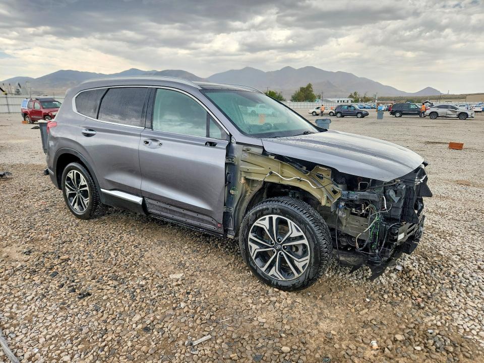 Photo 4 from auction – 2019 HYUNDAI SANTA FE with VIN 5NMS5CAA2KH059265