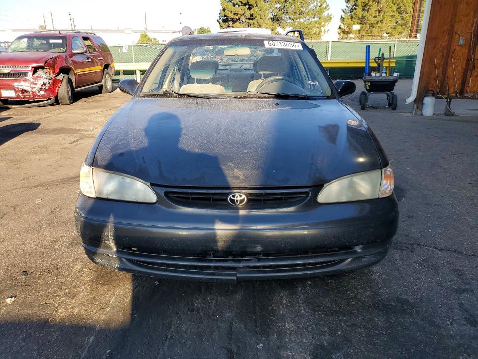 Photo 5 from auction – 1999 TOYOTA COROLLA with VIN 1NXBR12E1XZ258474