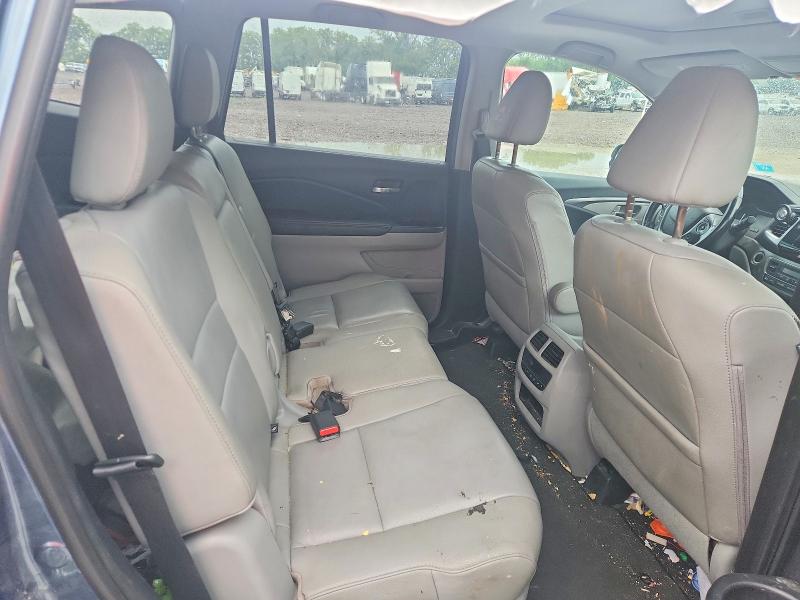 Photo 11 from auction – 2016 HONDA PILOT with VIN 5FNYF6H54GB009848