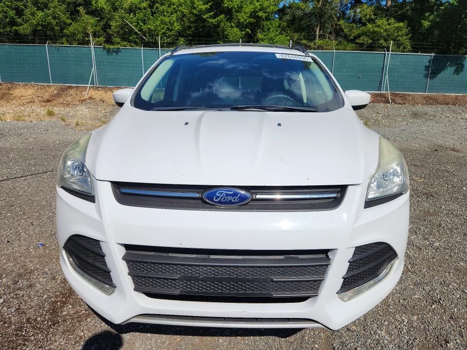 Photo 5 from auction – 2015 FORD ESCAPE with VIN 1FMCU9G98FUA31665