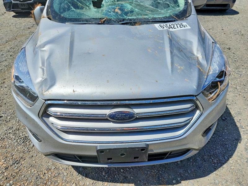 Photo 12 from auction – 2018 FORD ESCAPE with VIN 1FMCU9HD7JUC89459