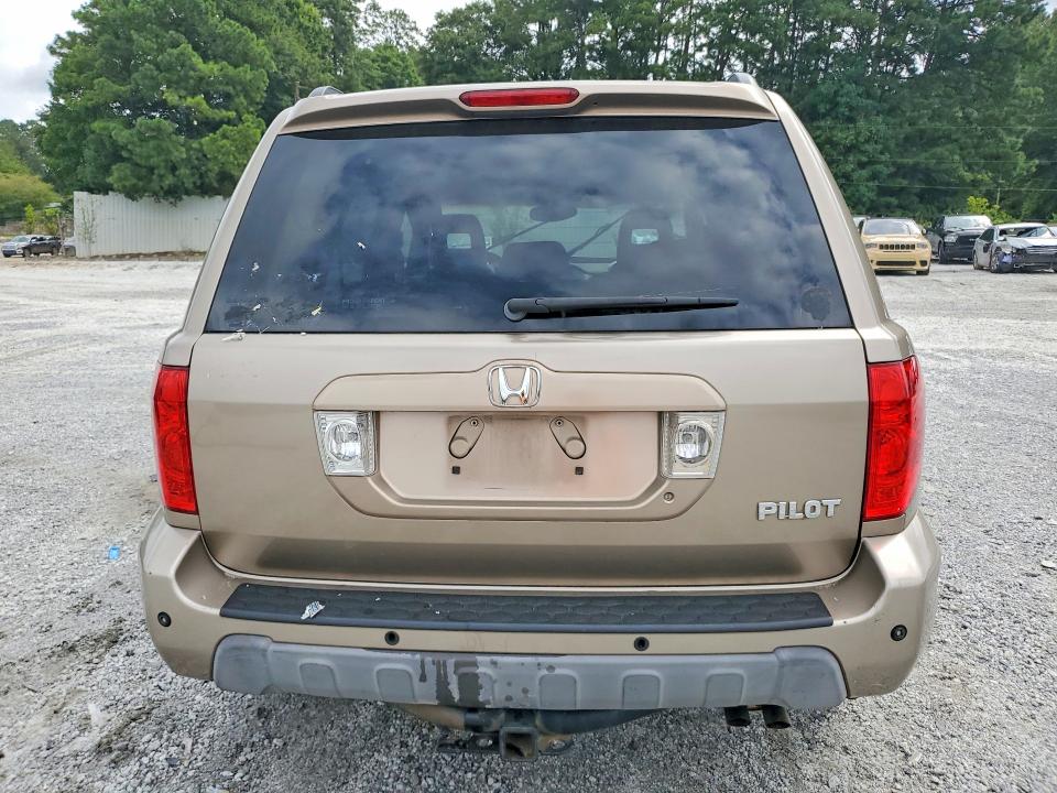 Photo 6 from auction – 2004 HONDA PILOT with VIN 2HKYF18524H557122