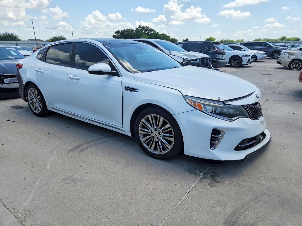 Photo 4 from auction – 2016 KIA OPTIMA with VIN 5XXGV4L21GG079076
