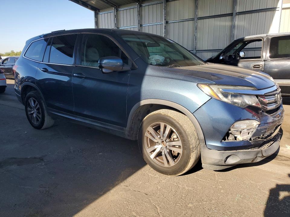 Photo 4 from auction – 2016 HONDA PILOT with VIN 5FNYF6H36GB102255